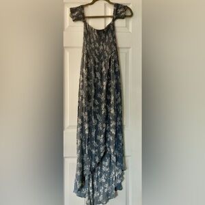 This Light Blue - Blue Rain dress embodies the essence of a serene summer day.